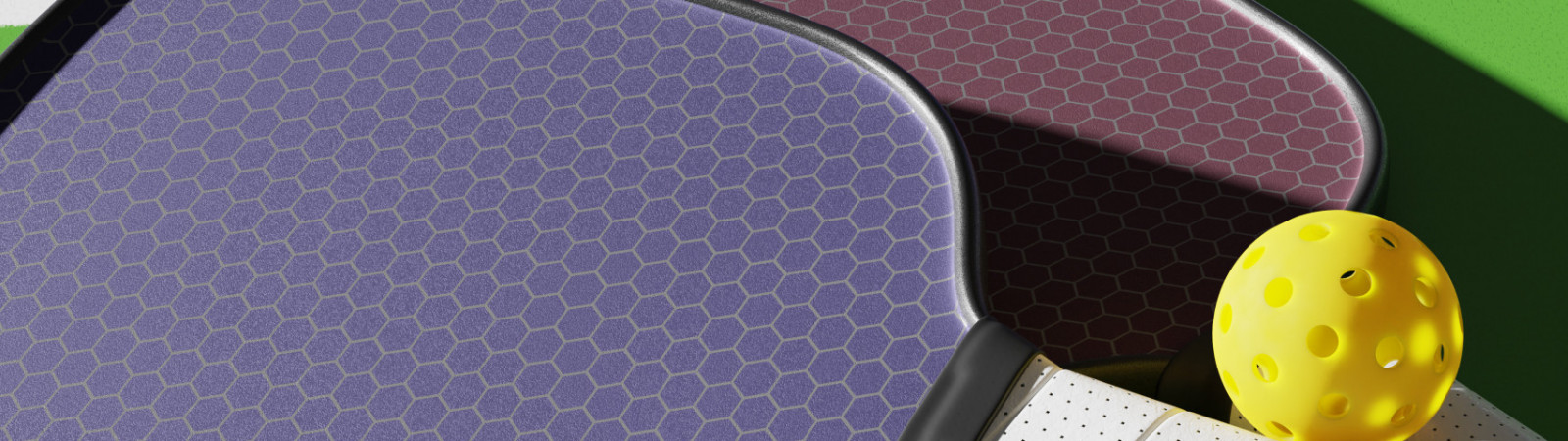 Two pickleball paddles and a ball on the court. Close-up 3D rendering